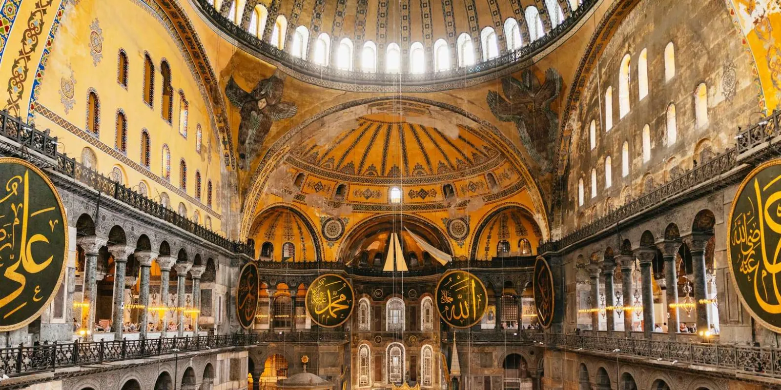 The gold-ground dome and calligraphic roundels of Hagia Sophia seen from the gallery